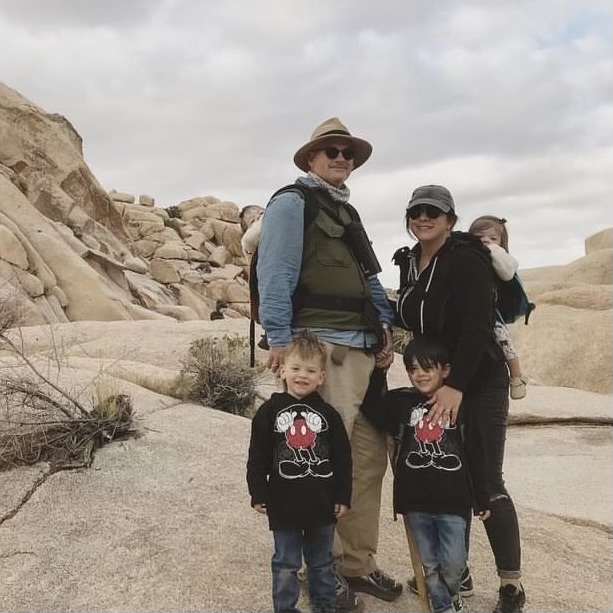 Family traveling and hiking at Joshua Tree National Park